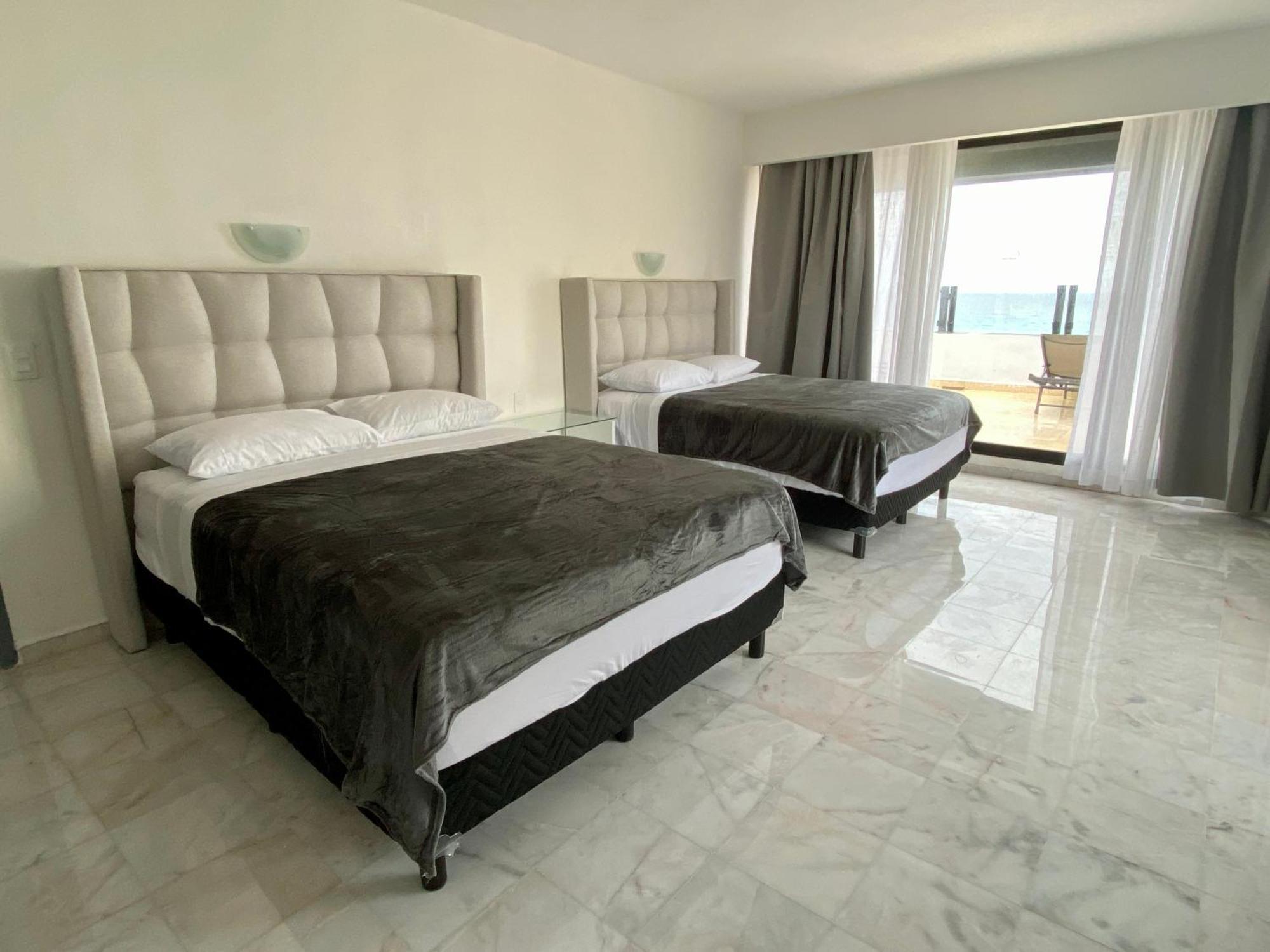 Condo In Ocean Front Resort 칸쿤 객실 사진